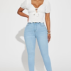 Alaia High Rise Stretch Skinny Jeans - Light Wash